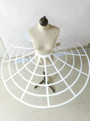 White cage petticoat back three-quarter overhead view displaying all 5 circular rigid white-coated metal hoops and full structured silhouette for lolita underskirt