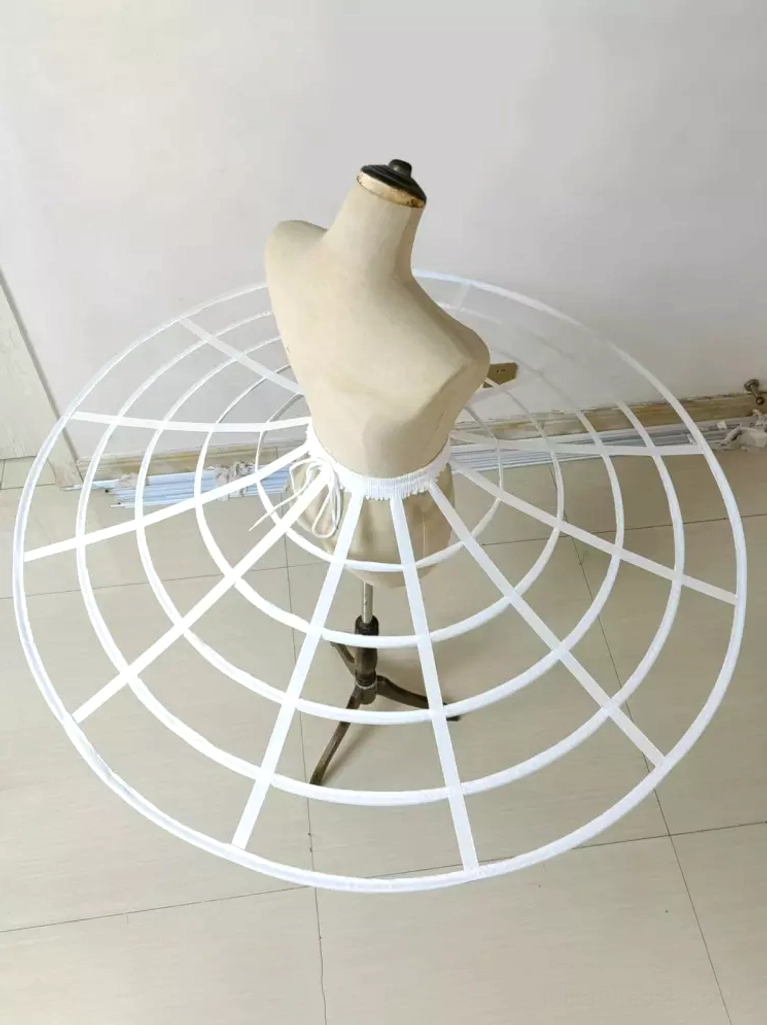Left side three-quarter view white cage petticoat displaying visible waist drawstring closure and complete grid hoop design for lolita fashion coordination
