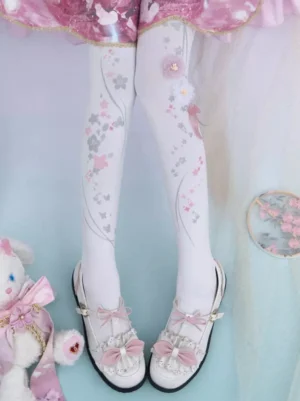 white floral lolita stockings front view with delicate pink and silver cherry blossom patterns worn with pink lolita coordinate