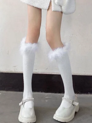 white fluffy trim knee high lolita socks front straight view elegant sweet style ribbed texture feather cuff with white patent leather loafers studio shot