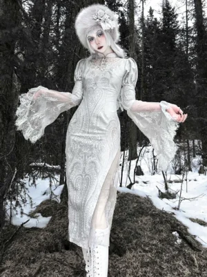 White Gothic Lolita cheongsam opera dress front three-quarter view snowy forest setting with model wearing fuzzy floral fur bucket hat and lace flared sleeves