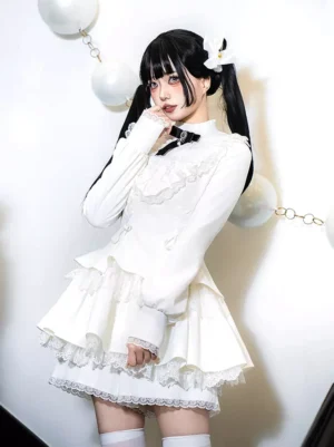 White gothic lolita dress with lace-up corset bodice and structured cravat neckpiece, front three-quarter view showcasing layered ruffle skirt and long sleeves