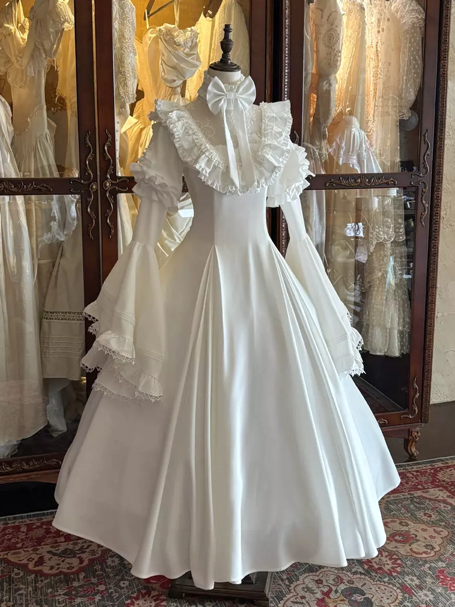 White gothic wedding lolita dress ruffled collar bow necktie floor length skirt pure white