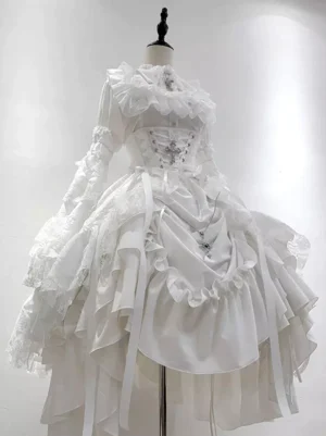 White gothic lolita dress set with lace-up corset waist, high ruffled collar, long lace sleeves, and asymmetrical layered skirt displayed on dress form