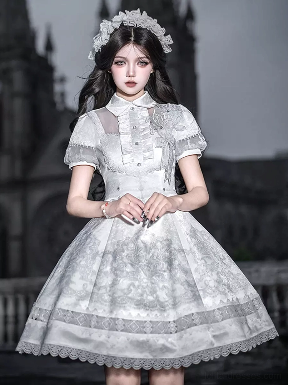 White Gothic Lolita JSK dress with short puff sleeves and Peter Pan collar front full-body view on model in church setting showing lace cross print and A-line silhouette