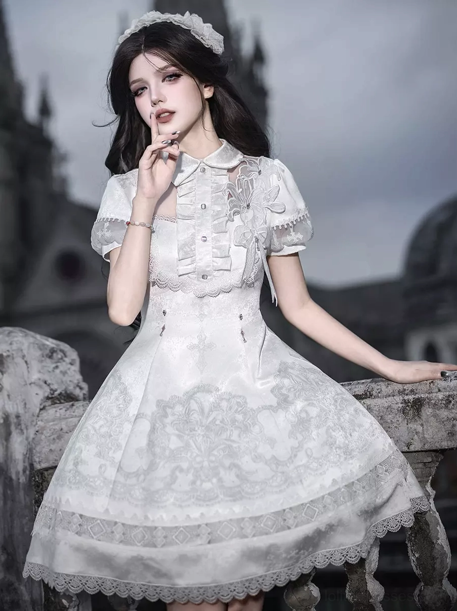 White Gothic Lolita JSK side view showing ruffled front placket floral lace print design with matching hair headband and scalloped lace hem trim