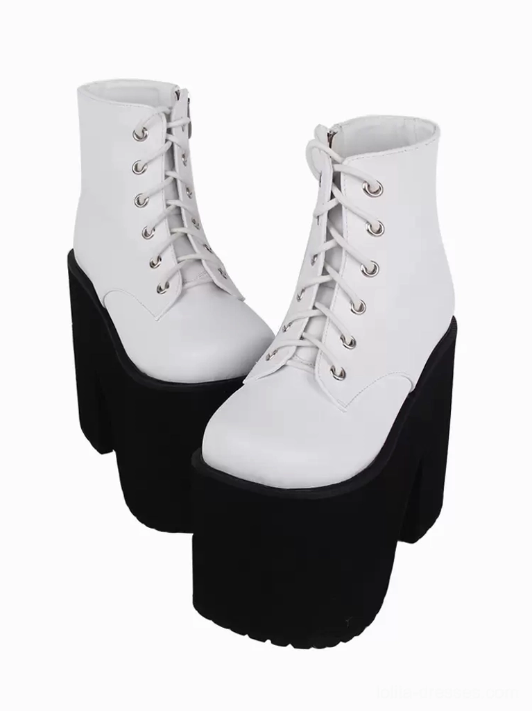 White gothic lolita platform ankle boots front view pair showing high chunky wedge heel and crisscross lace-up design from alternate angle