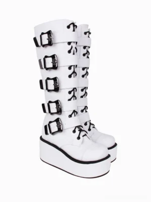 White gothic lolita boots side three-quarter view displaying black lace-up patterns, adjustable silver buckle hardware, architectural round toe shape, substantial flatform sole with black edge trim detail