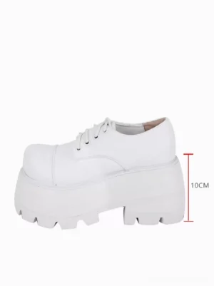 single white gothic lolita pump side view showing 10cm high platform sole wedge heel height indicator