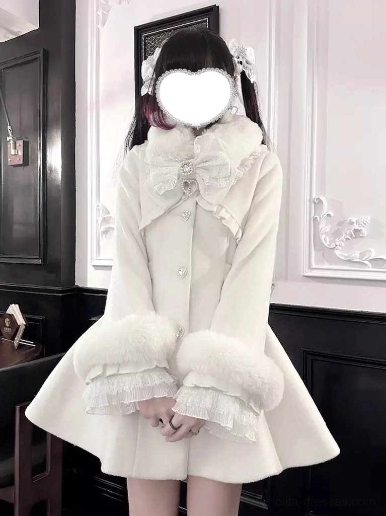White Gothic Lolita wool overcoat full front view with model wearing twin tails and white flower hair clips, furry collar bow, ruffled lace under cuffs, A-line hem