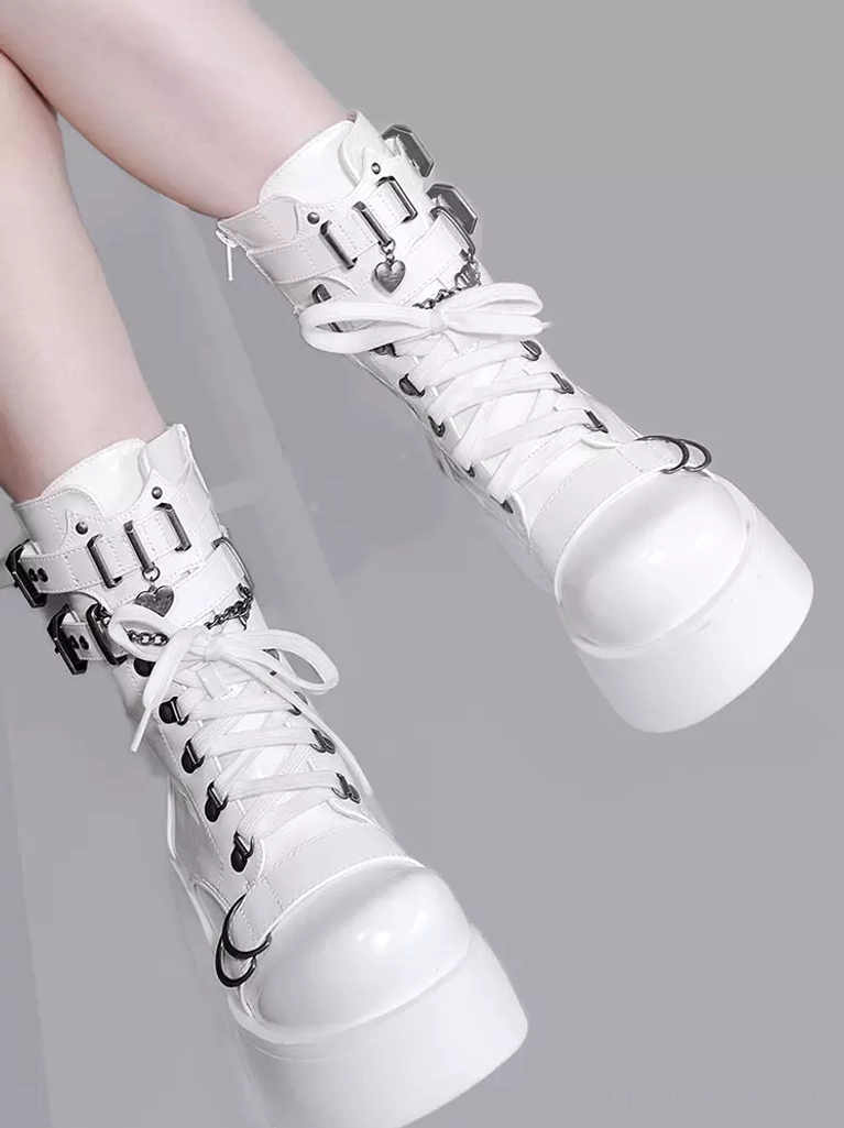White platform combat boots flat static product display gray background metal buckles crescent hardware chunky white sole side angle