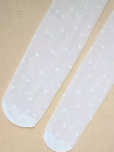 Pair of sheer white heart-print Lolita thigh-high stockings flat lay with closed toe design on light brown background