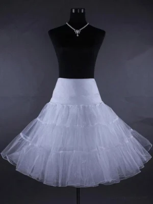 White high-waist lolita petticoat with tiered ruffled sheer tulle construction shown on dress form, demonstrating alternative colorway and layered volume architecture essential for lolita coordinate building