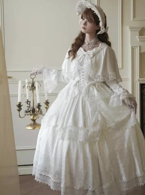 Three-quarter front view of white formal Lolita dress showing tiered lace skirt, structured corset bodice, formal gloves, and coordinated hair bonnet in vintage European interior