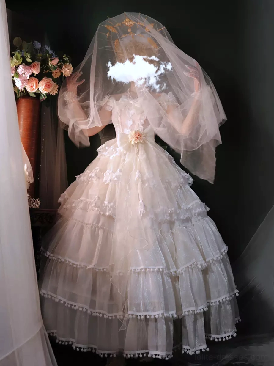 White hime wedding sweet lolita dress detail showing tiered tulle construction, lace pom-pom trims, and classic silhouette