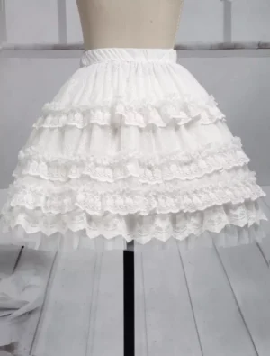 Pure white lace ruffled tiered lolita skirt front view on dress form, showing elastic waistband, layered tulle construction, and scalloped lace hem, classic romantic lolita style