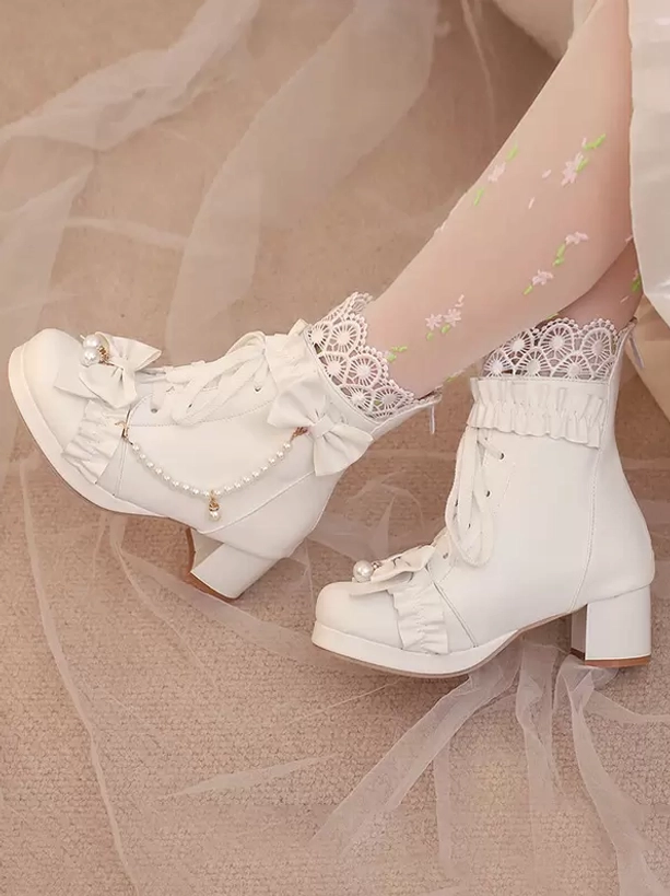 White lolita ankle boots oblique side double feet floral sheer socks sheer fabric background bow pearl details