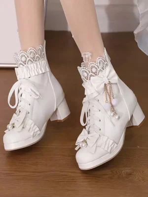 white lolita boots lace-up front ankle collar ruffled trim overhead top-down view model feet