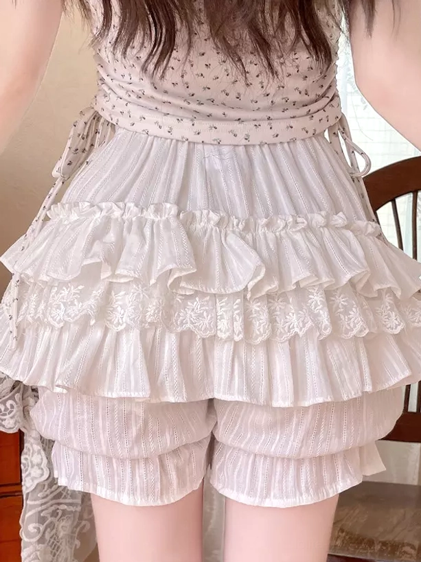White lolita bloomers front right angle close-up lace-trimmed layered ruffles elastic waist bow on leg cuffs