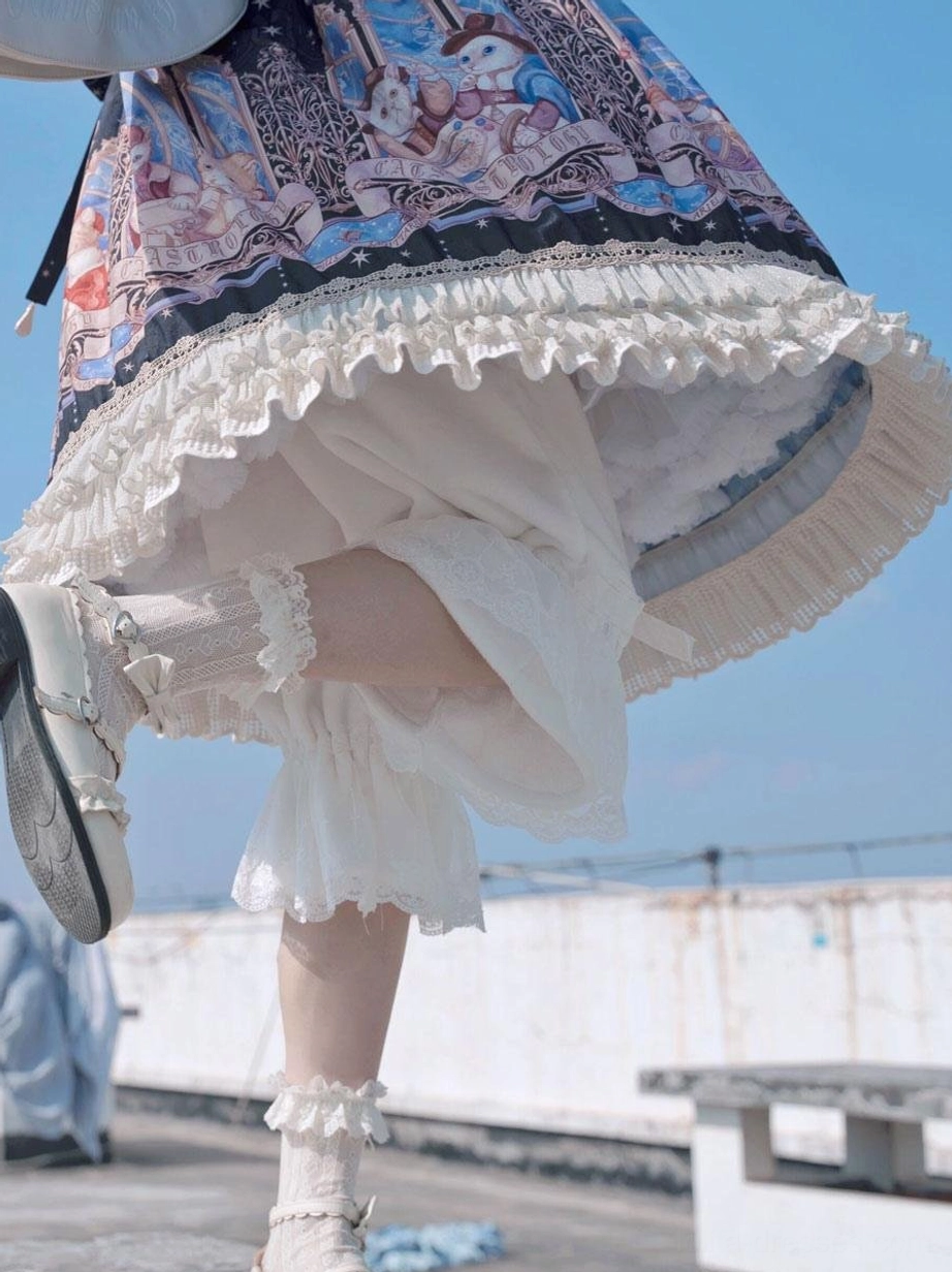 Lolita bloomers with printed lolita skirt side lower body view outdoor rooftop white lace-trimmed bloomers frilly lace socks bow shoes
