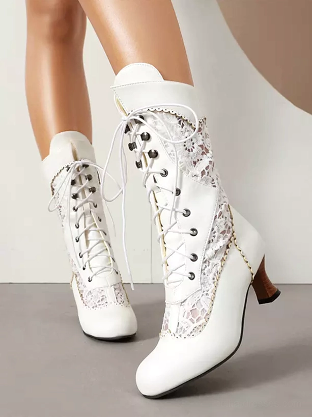white vintage lolita boots side three-quarter view showcasing pu leather construction curved kitten heel