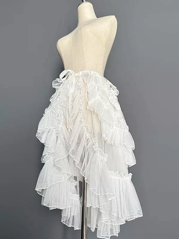 White sweet lolita overskirt train with tie-waist and asymmetrical ruffled tulle hem photographed from rear side angle
