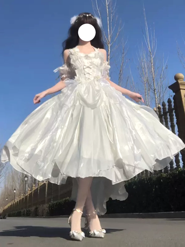 White high-low lolita dress back full-body view sleeveless ruffled off-shoulder design shiny satin fabric outdoor street lolita coordinate
