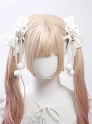White sweet Lolita hair clips with snowflake rhinestones and fluffy cream pom-poms styled on mannequin with gradient blonde twin-tail ponytails, front view showing detailed bow design
