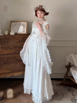 elegant white lolita gown three-quarter view, flowy bell sleeves with beaded waist decoration, floor-length chiffon skirt, beaded ornaments, sweet lolita style dress with flower hair accessories