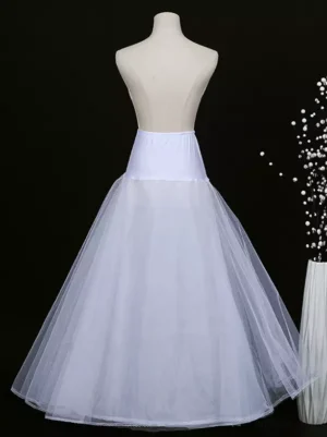 White lolita petticoat back view showing layered sheer tulle construction and precisely hemmed edge detail on headless dress form
