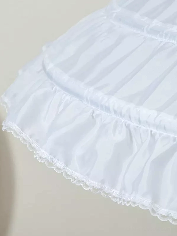 Side angle close-up of lolita crinoline petticoat hem showing striped pleated layers lace ruffled edge and structured silhouette
