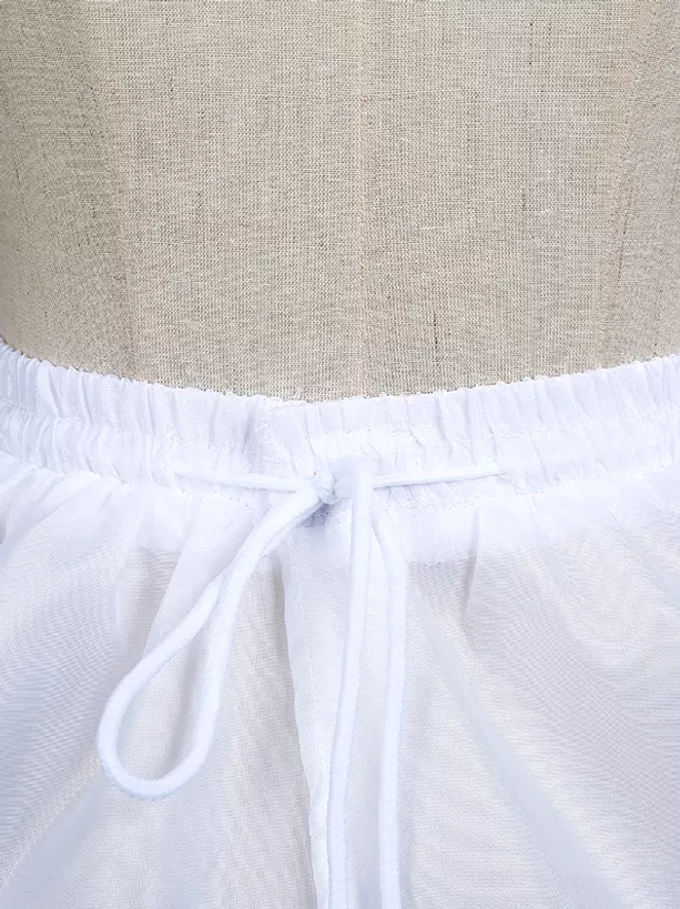 Close-up top-down view of white lolita petticoat waist section showing elastic drawstring waist and sheer white mesh tulle fabric construction detail
