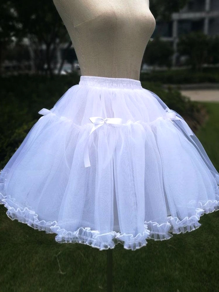 White lolita petticoat with elastic waistband satin bows fluffy tulle silhouette mesh trim outdoor garden setting