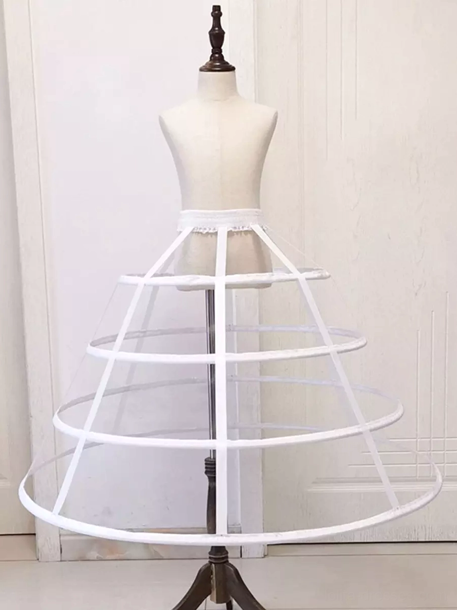 White 4-layer lolita petticoat cage bustle with rigid boning hoops creating bell-shaped silhouette, front flat lay view on dress form