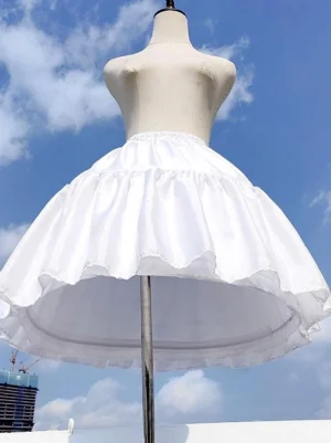White lolita petticoat front oblique view showing ruffled hem and elastic waist on dress form at outdoor rooftop venue
