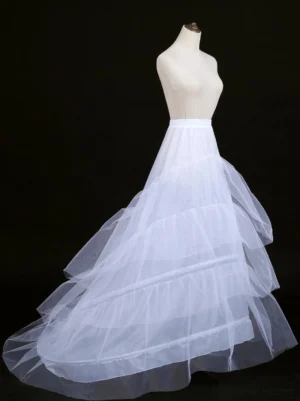 white gothic lolita petticoat left side profile view displaying layered tulle tiers and sweeping train