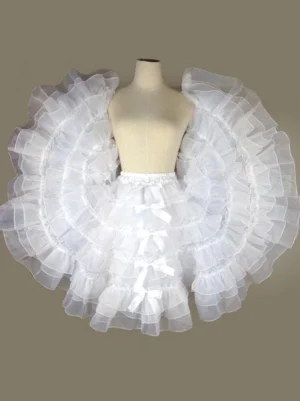 White ruffled lolita petticoat top-down view showing circular layered ruffles with front satin bows and elastic waist
