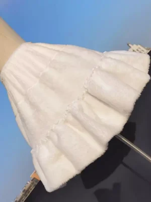 white lolita underskirt side low angle perspective displaying elastic waistband ruffled hem and soft texture on mannequin