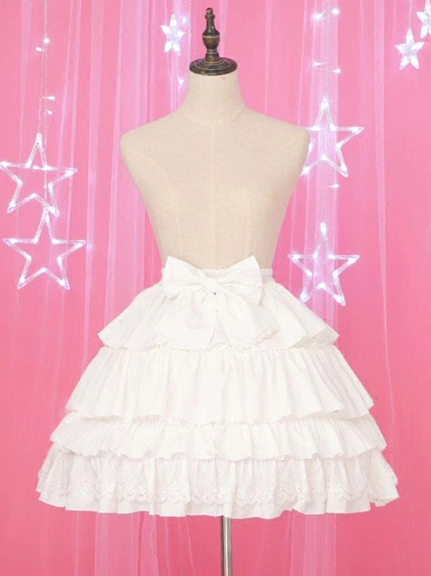 White Lolita petticoat full front view on mannequin showing tiered ruffles and bell silhouette with lace trim detail and back bow