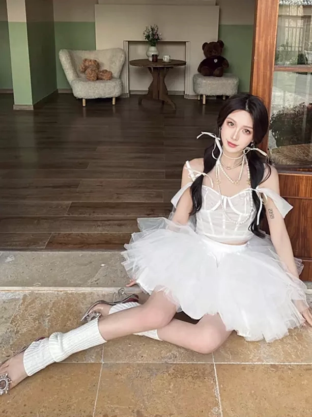 white off-shoulder lolita petticoat coordinate vintage indoor setting tie-up straps leg warmers fluffy tulle skirt