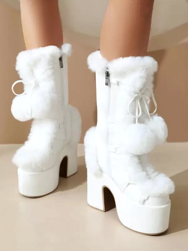 white lolita platform boots front three-quarter view dual pom-pom bow styles fuzzy fur chunky platform