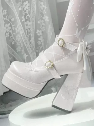 White Sweet Lolita platform high heel pumps side profile view showing chunky block heel and single gem strap detail on display stand