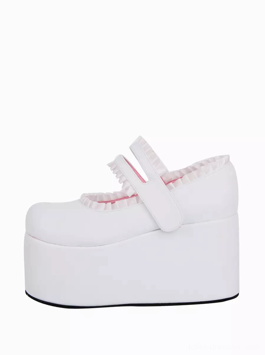 Single white lolita platform shoe right side close-up profile view displaying ruffled collar embellishment, velcro ankle strap, and pure white PU leather exterior