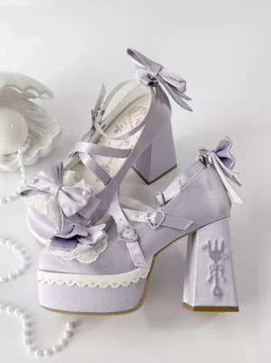 White lolita platform shoes with cross straps back bow and scalloped edge flat lay product display
