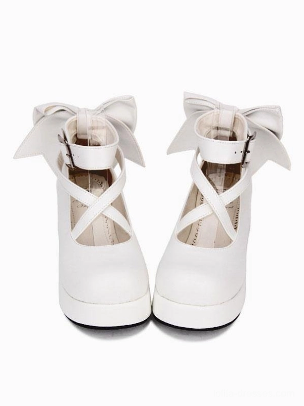 White Lolita platform wedge shoes with cross-strap buckle system, rear bow decoration, and sturdy platform sole, front direct view