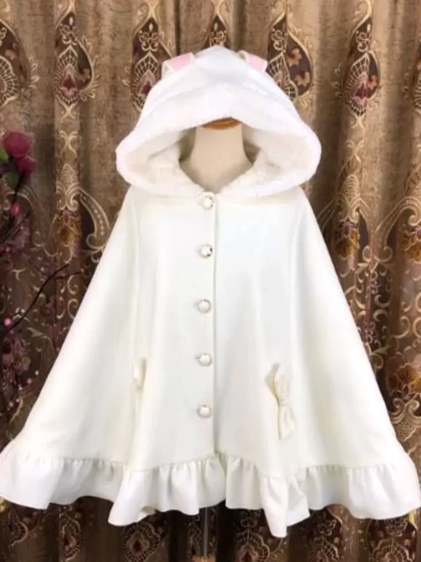 White Lolita poncho coat front full view with furry hood, pearl buttons, decorative bow pocket trims, and elegant ruffled hemline