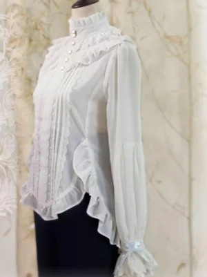 Left side view of white ouji lolita blouse showing asymmetric ruffled hem lantern sleeves and lace-decorated collar detail on mannequin
