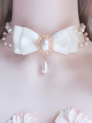 White sweet Lolita pearl bow choker necklace with double pearl chains and rose gold teardrop pendant charm displayed on mannequin neck with pink flower styling
