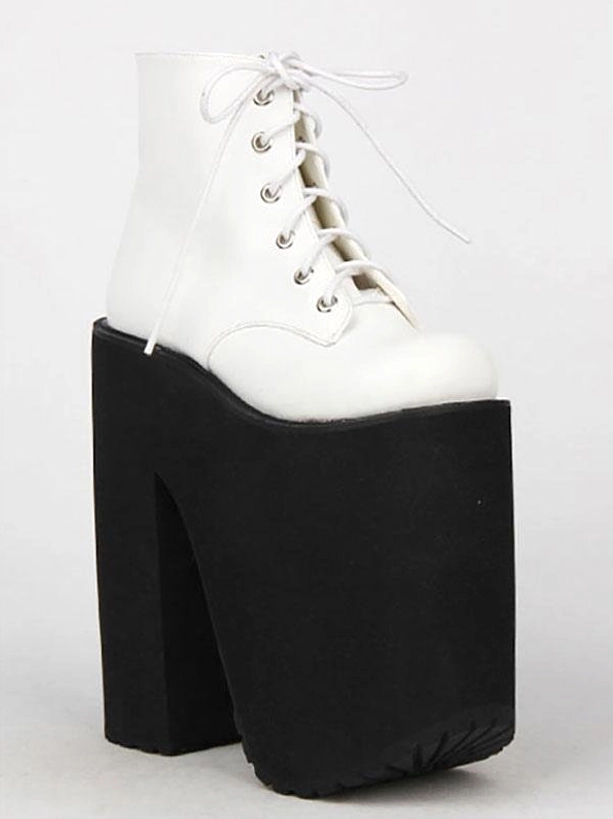 Single white platform ankle boot side profile view glossy white leather ultra thick block heel lace-up closure 20cm heel