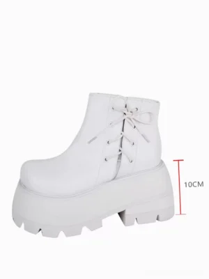 single white lolita platform boot side three-quarter view showing 10cm heel height lace-up structure detail